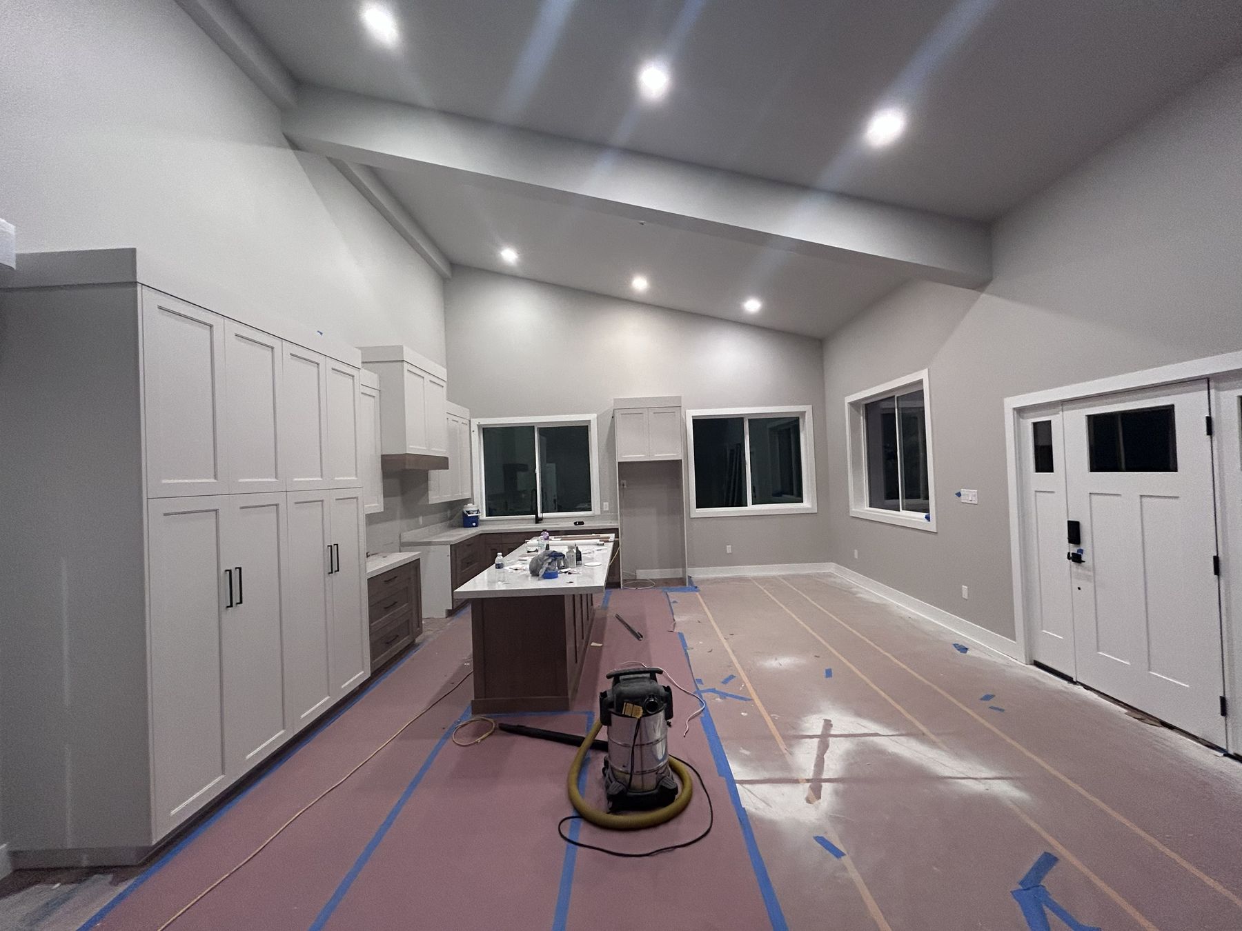 Example vaulted great room and kitchen interior, illustrating typical finish quality